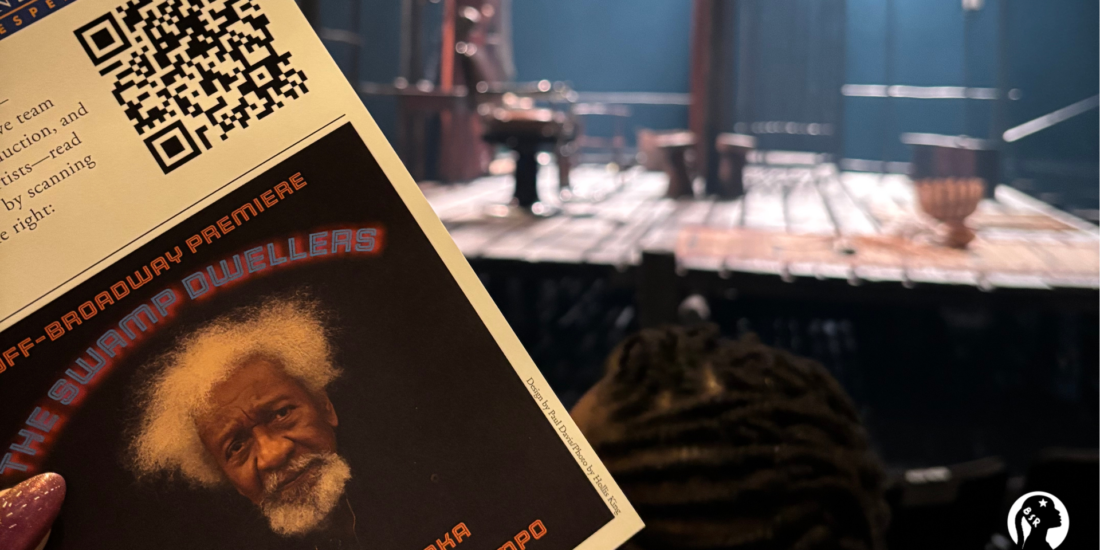 a theatre program in front of a stage