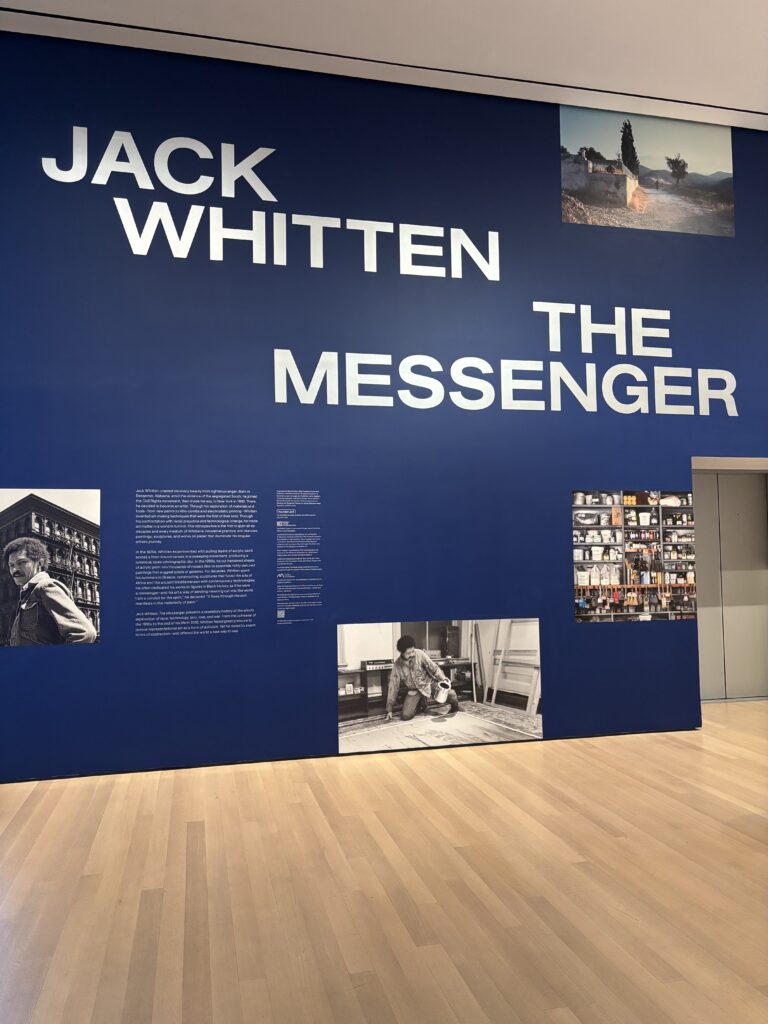 a wall is decorated with images and text