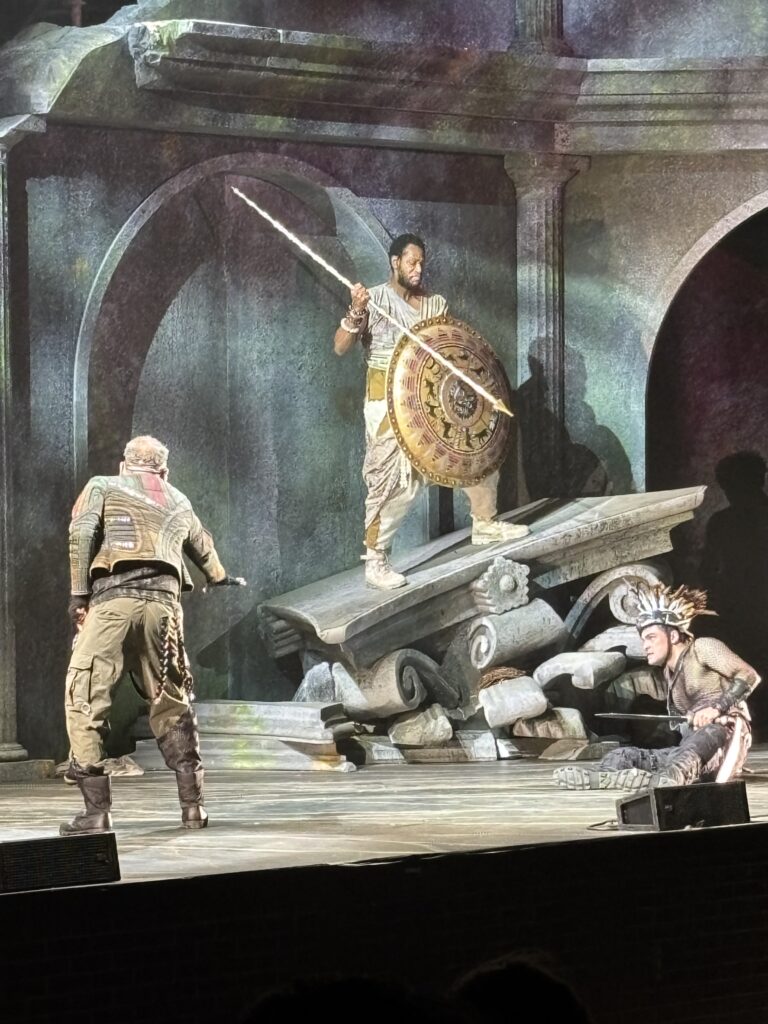 Performers stand on the stage