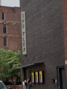 A view of The Flea theater building from the sidewalk