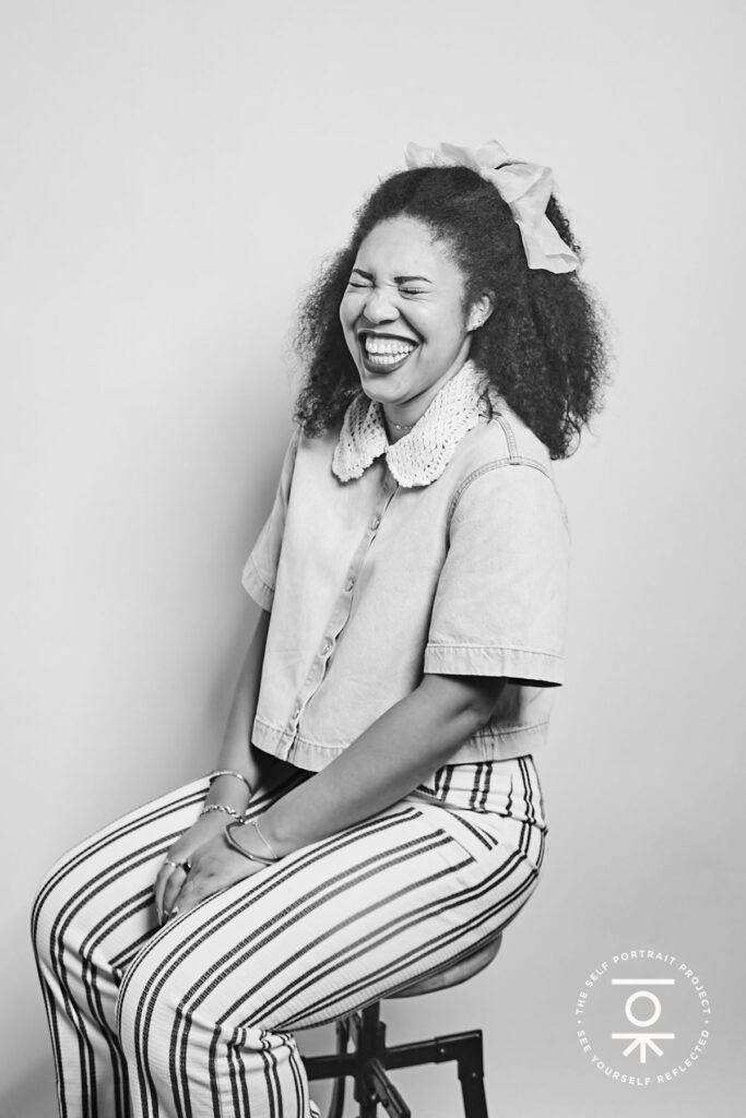 Another photo of a woman on a stool (black and white photo)